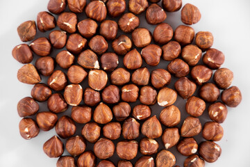healthy hazelnuts on white background
