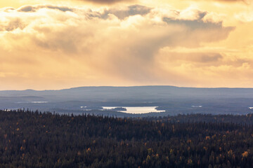 Big rain cloud over autumn forest in Lapland, Finland, Riisitunturi