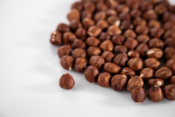 healthy hazelnuts on white background