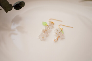 Handmade flower earrings made from Praban