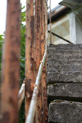 Atmospheric photo of an old staircase overgrown with grass