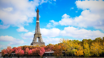 Eiffel tower with blue sky at paris from the river seine in autumn season,France