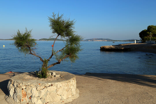 Sunny morning on the sea beach Zablace in Croatia