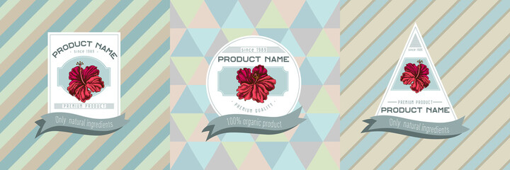 Three colored labels with illustration of hibiscus
