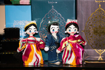 Uzbek kuls made of cloth stand on a shelf