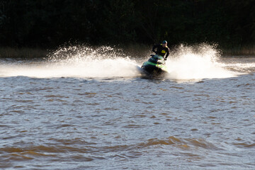 Russia, Pushkin-August 21, 2020:Photo of a jet ski swimming fast on the river