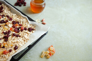 Cooking muesli. Fresh homemade muesli. Healthy breakfast or snack. Copy space