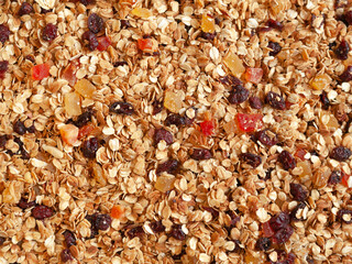 Organic homemade Granola Cereal with oats and almond. Texture oatmeal granola or muesli as background. Top view or flat-lay.