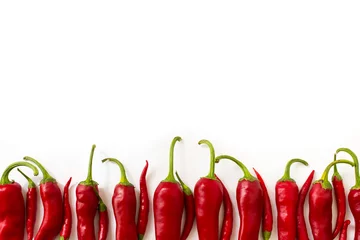 Fotobehang red bitter chili pepper on white clean background for text © Nastia