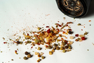 Spicy himalayan salt and pepper mill salt shaker, isolated on yellow background. Copy space for...