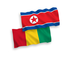 Flags of North Korea and Guinea on a white background