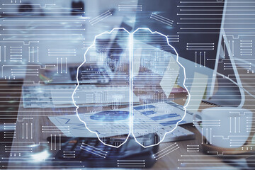 Multi exposure of work space with computer and human brain hologram. Brainstorm concept.