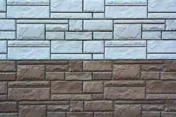 texture of mosaic masonry in dark and light colors