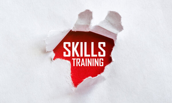 white torn paper with text skills training on red background