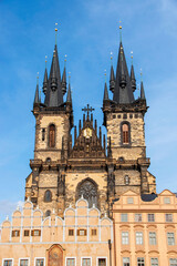 Fototapeta na wymiar Tyn Church in the rays of the evening sun. Prague, Czech Republic