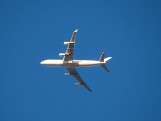 Aeroplane flying high above Sydney Harbour Australia