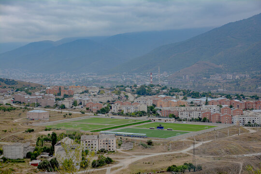 City from a bird's eye view. Residential buildings of the city. Bird's eye view of the Armenian city of Vanadzor