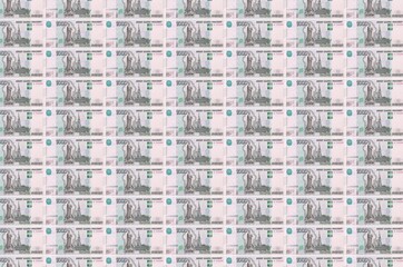 1000 russian rubles bills printed in money production conveyor. Collage of many bills. Concept of...