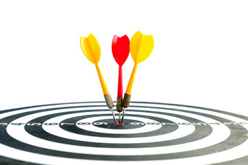 Close up shot red dart arrow on center of dartboard, metaphor to target success, winner concept, Isolated on white background.
