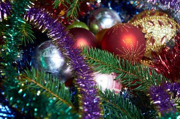 Obraz na płótnie Canvas Christmas decorations for the tree on a wooden table