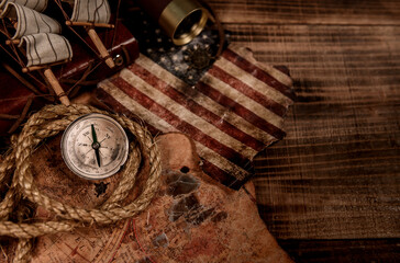 Columbus Day background. Map and discovery of old equipment. Exploration and history of America in...