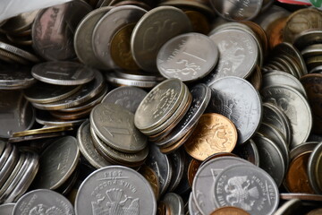 Placer of Russian coins of different sizes and denominations close-up. Coins with an edge. Lots of coins.