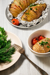 Baked potatoes with parmesan cheese and bacon