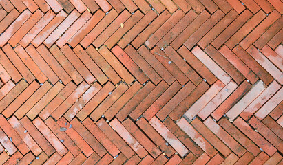 Old red brick pavement texture background. Retro style.
