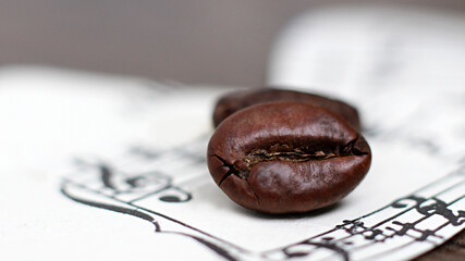 Coffee beans and paper notes, macro