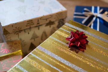 Christmas gift boxes adorned with pretty sparkly bows.