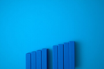 blue domino blocks of stairs with one empty in the middle.