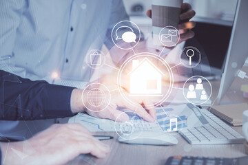 High tech city drawing with businessman working on computer on background. Smartcity concept. Double exposure.