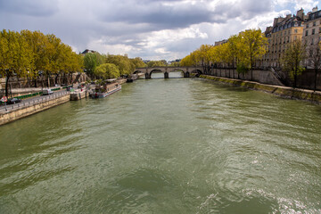 Wide river and riverbank in a European city