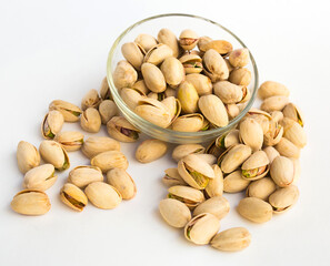 roasted pistachios on white background