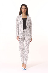 Obraz premium business woman executive in floral printed summer white pant suit - jacket and trousers