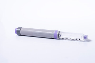 syringe over white background