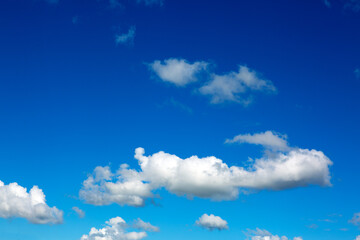 Naklejka na ściany i meble White clouds and blue sky background . Nature background.