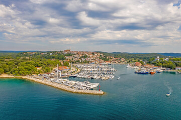 Naklejka na ściany i meble Aerial panoramic drone picture of Vrsar harbour in Croatia with turquoise water during daytime