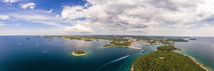 Fototapeta na wymiar Wide angle panoramic drone picture over shore and islands along adriatic coast of Vrsar