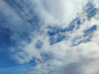 Naklejka na ściany i meble blue sky with wonderful white clouds