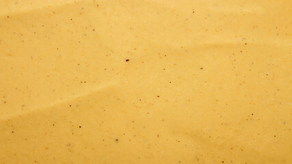 Russian mustard.The texture of the mustard.Yellow mustard background top view.