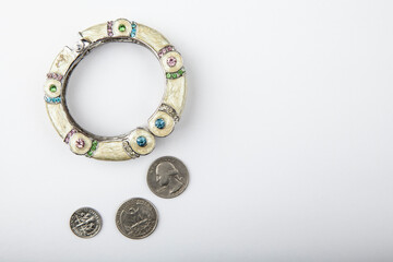 image of bracelet coin white background