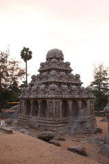 View of Ancient Monolithic temples Five Rathas (Indian: Pancha Rathas) of Mahapalipuram under sunset in Tamil Nadu, India