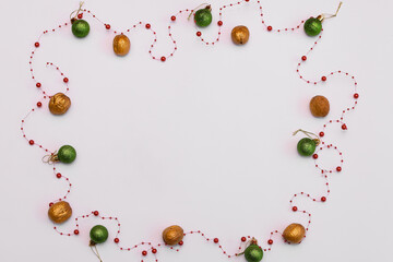 Fototapeta na wymiar space for an inscription on a white background with snowflakes and christmas balls