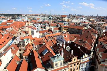 Fototapeta na wymiar Classic Prague - aerial view to old roof buildings and street , Czech Republic
