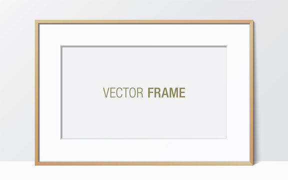 Wide wooden frame with passe-partout leaning against the white wall. Horizontal blank elegant frame template. Picture frame vector mockup.