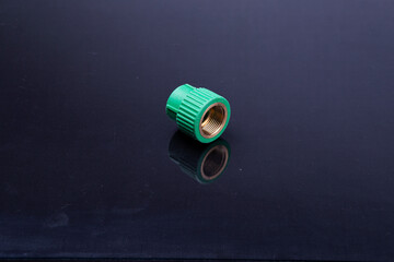  Plastic T-tube fittings on Black background, PVC Pipe connections, PVC Pipe fitting, PVC Coupling
