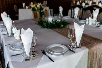 wedding decorations with candles in a restaurant at a banquet