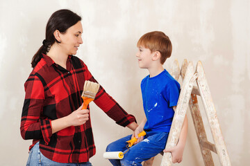 Repair in the apartment. Young family renovating their home together.