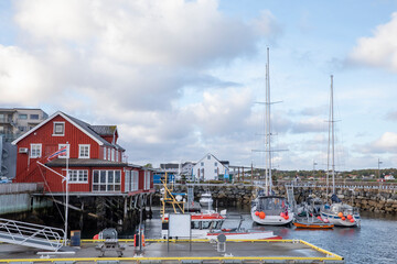 Fototapeta na wymiar Guest marina with red sea house in Bronnoysund Nordland county